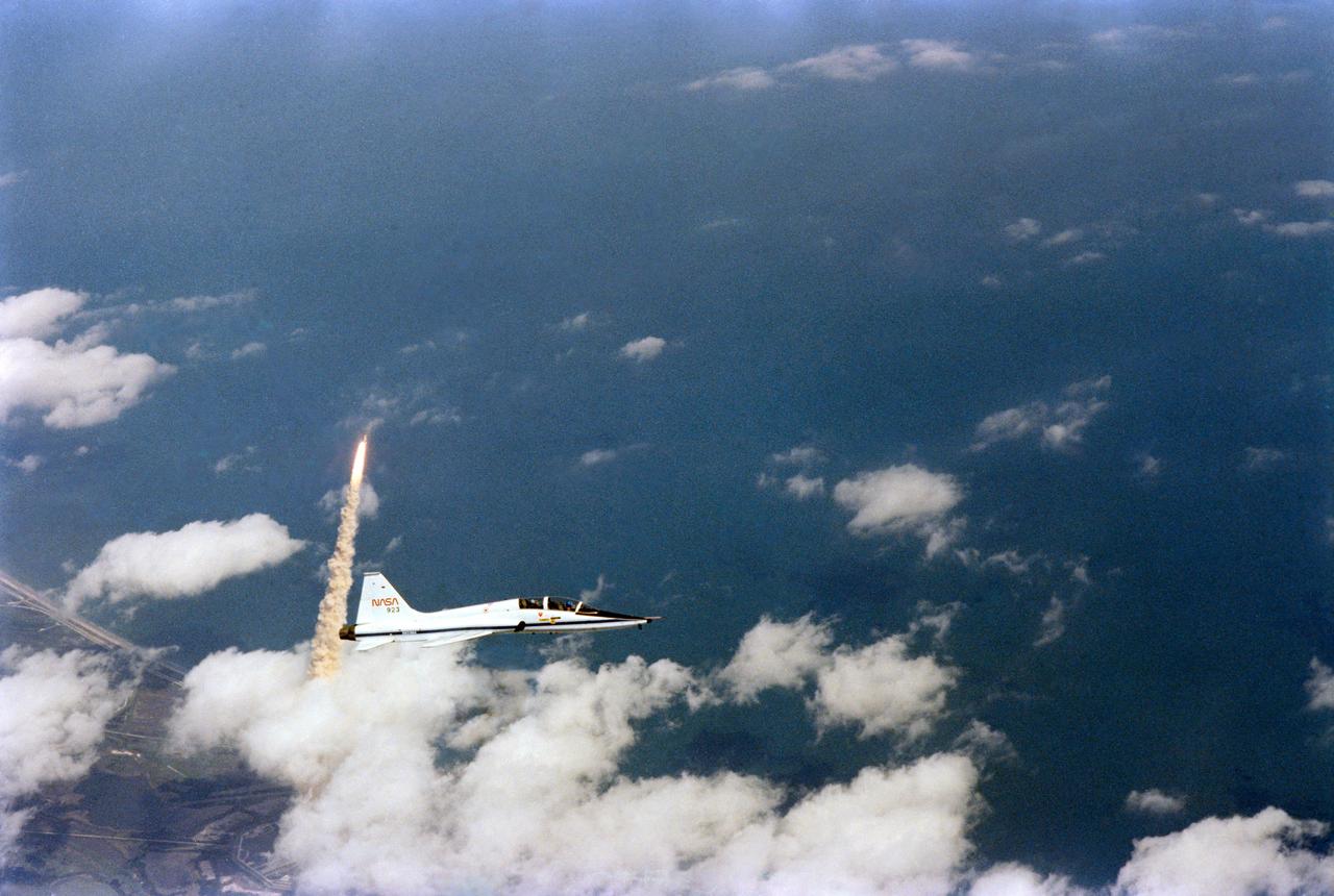 Air-to-air views of STS-3 Launch from T-38 Chase Aircraft.        KSC, FL