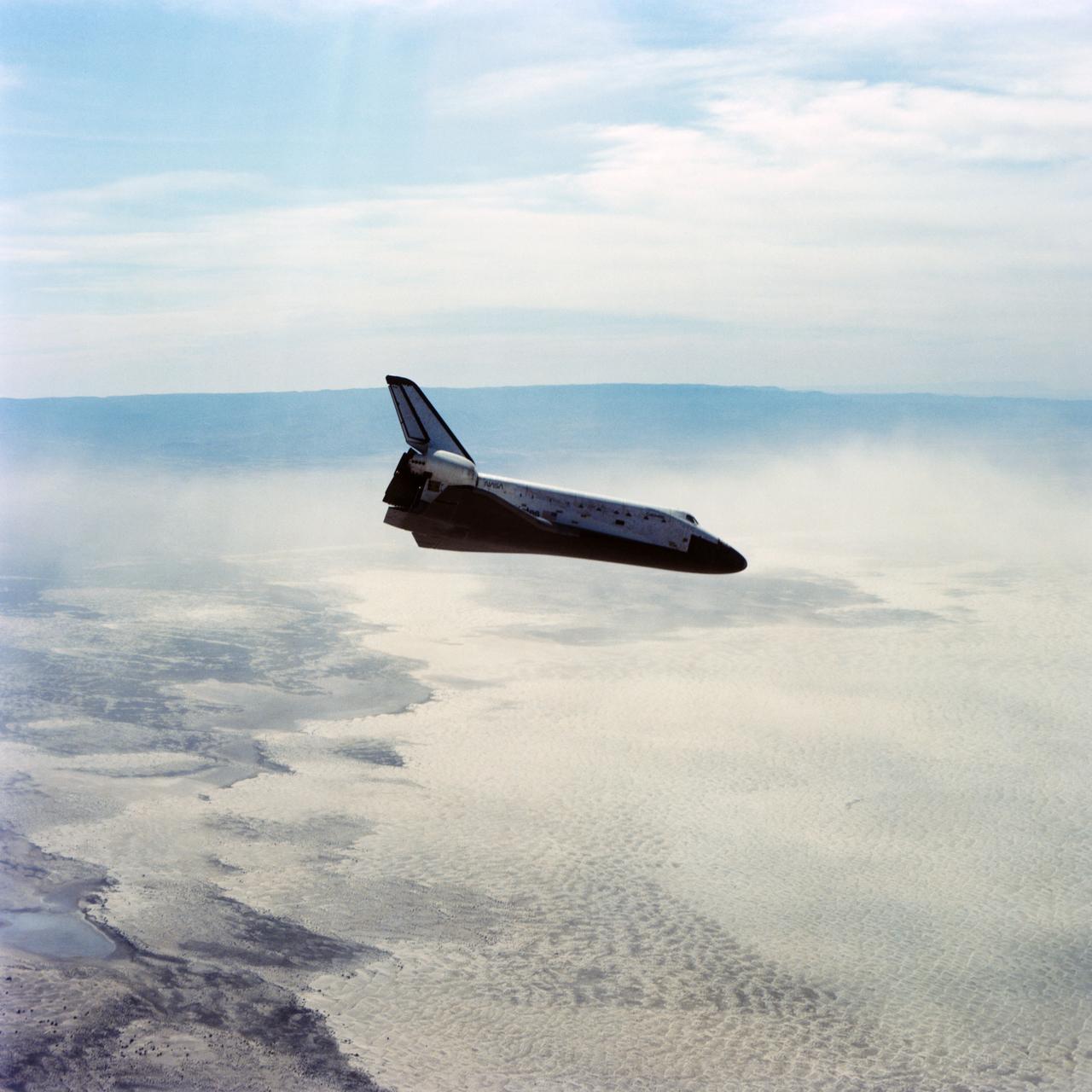 Air-to-air coverage of Orbiter inspection during its descent, along side and during touchdown.          NORTHRUP STRIP, WHITE SANDS, NM          Also available in 70 CN