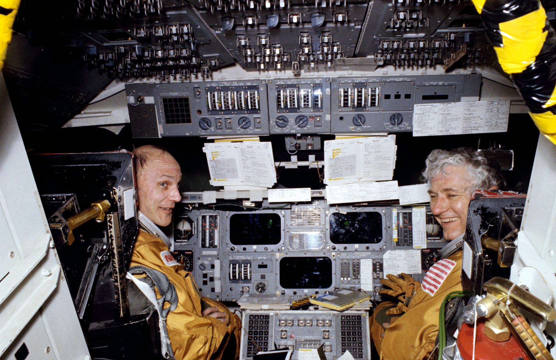 Astronauts Ken Mattingly and Henry Hartsfield are seen in the cockpit of the space shuttle simulator during training