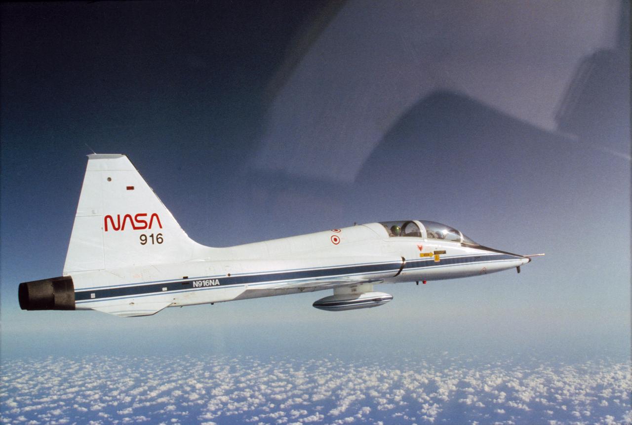 NASA 916, a T-38 jet aircraft, carrying astronauts Vance D. Brand (front         station) and Robert F. Overmyer, heads for Kennedy Space Center in Florida.                 1.  STS-5 - PREFLIGHT              KSC, FL              Also available in 4x5 CN