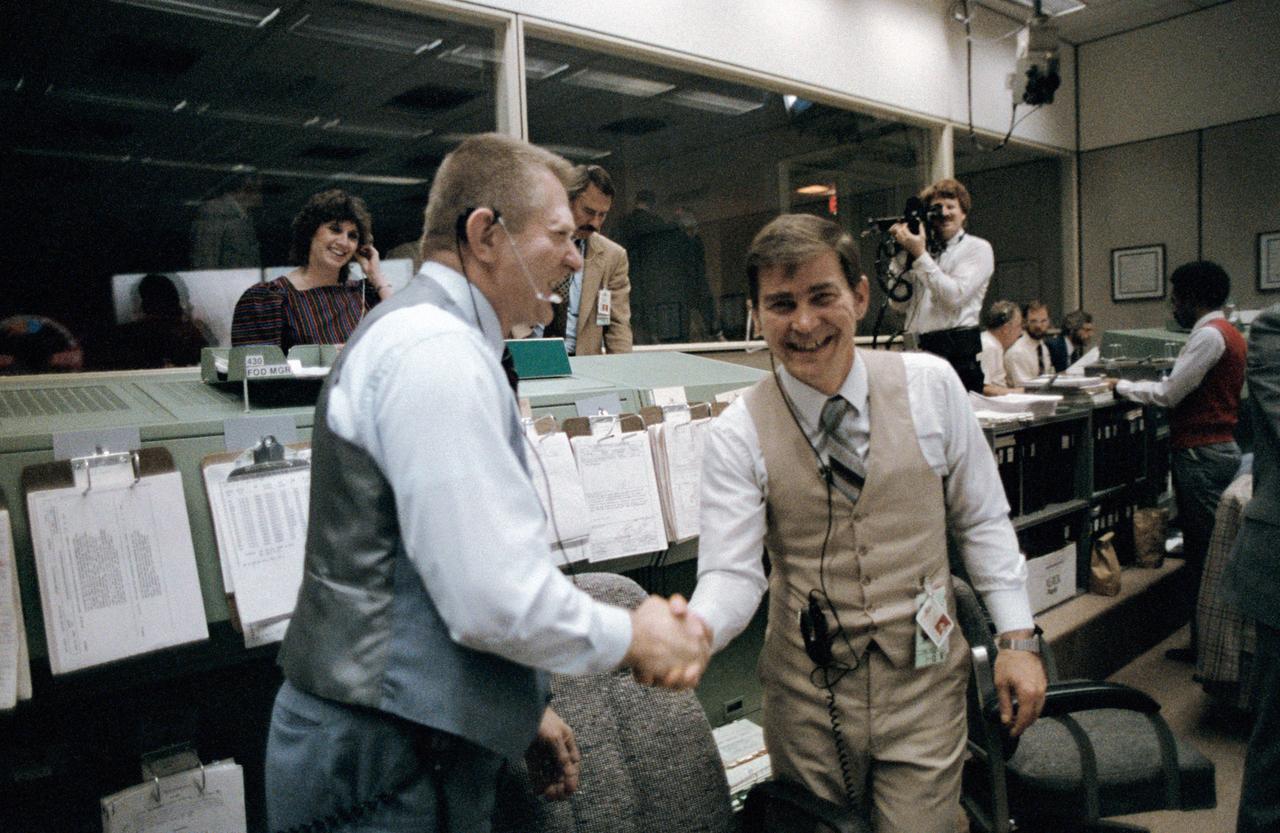 Various views of STS-6 MOCR activities during Day-5 with Vice-Pres. George Bush, Cap Communicator Bridges, JSC Director Gerald Griffin, Eugene F. Kranz, NASA Admin. James M. Beggs, Cap Com Astronaut O'Connor, Flight Directors Jay H. Greene, Gary E. Coen, and Harold Draughon.                   1.  BUSH, GEORGE, VICE-PRES. - STS-6 MOCR         2.  DIR. GRIFFIN, GERALD D. - STS-6 MOCR         3.  ADMIN. BEGGS, JAMES M. - STS-6 MOCR         4.  FLT. DIRECTORS - STS-6                  JSC, HOUSTON, TX                  Also available in 35 CN