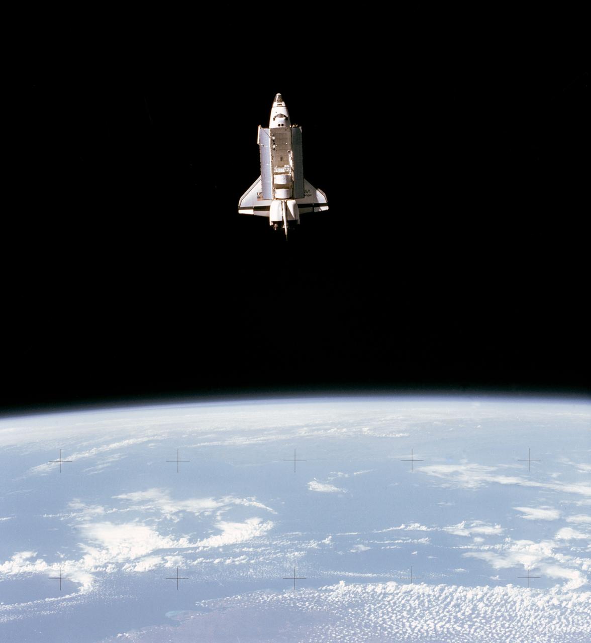 Full views of "Challenger" in Space, taken by the Shuttle Pallet Satellite (SPAS), also views of Cargo Bay and Remote Manipulator System (RMS) extended.      1.  SHUTTLE - RMS (STS-7)      Also available in 4x5 CN