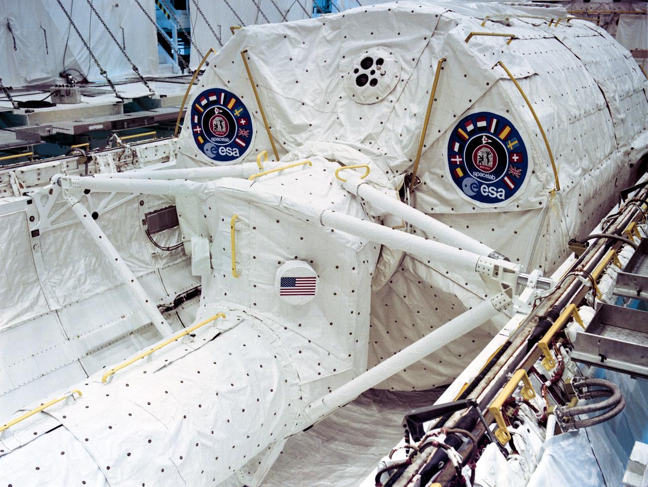 Spacelab I is installed in the Orbiter Columbia and connected to the Orbiter Crew Compartment by the Crew Access Tunnel. The tunnel allows the Astronauts to travel between the Orbiter Crew Compartment and the Spacelab in "shirt-sleeve" conditions. KSC, FL Also available in 4x5 B&W