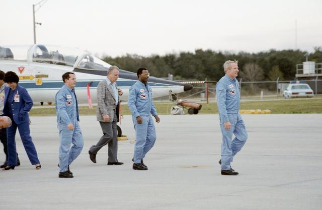 NASA image: STS 41-B astronaut crew members arrive in Florida