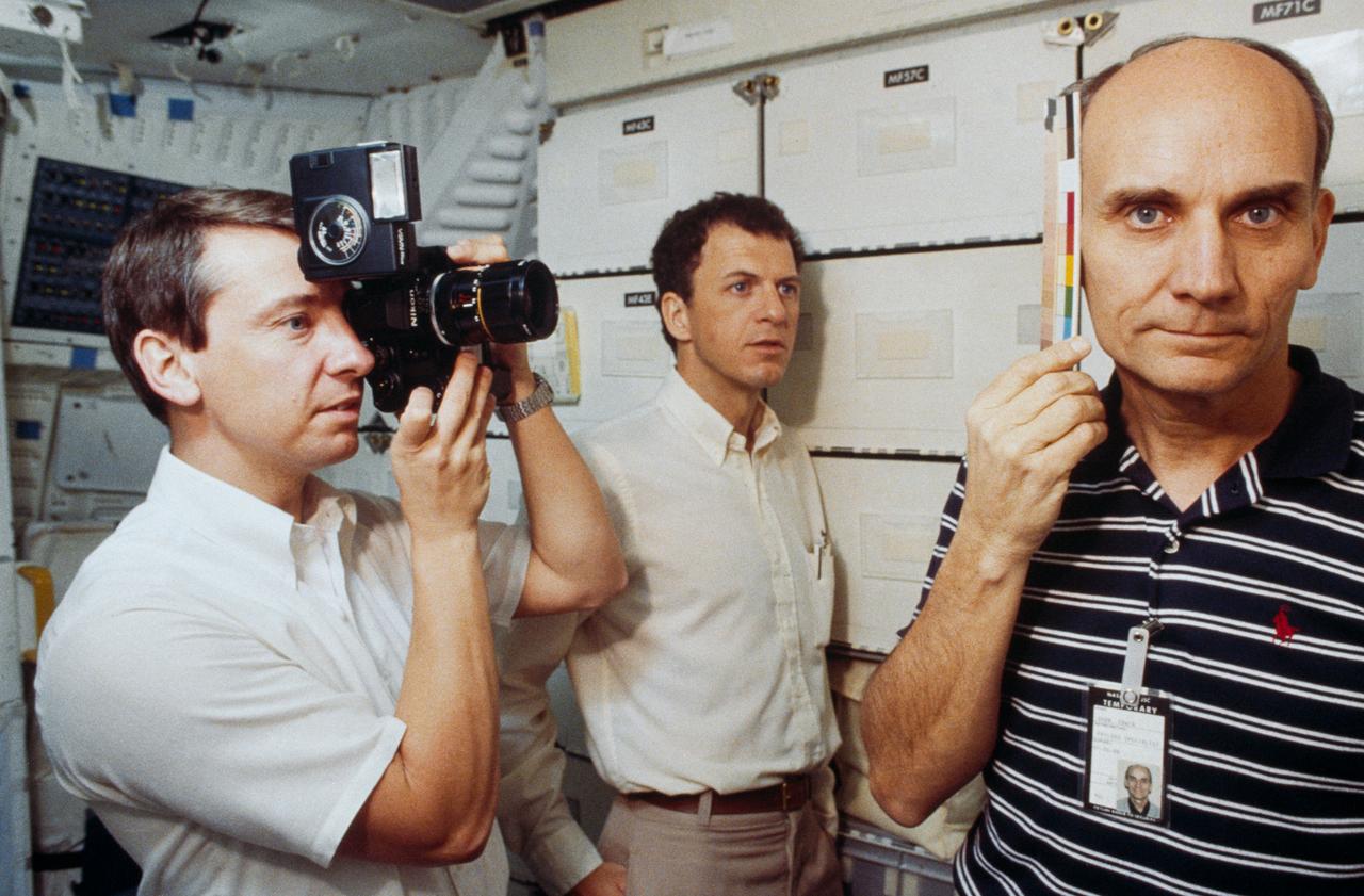 Views of Sen. Jake Garn and Charles Walker during STS-51B, Medical Experiment Training, 1-G Trainer, Bldg. 9A.         1. Senator Jake Garn - STS-51B Training    2. Charles Walker - STS-51B Training         JSC, Houston, TX
