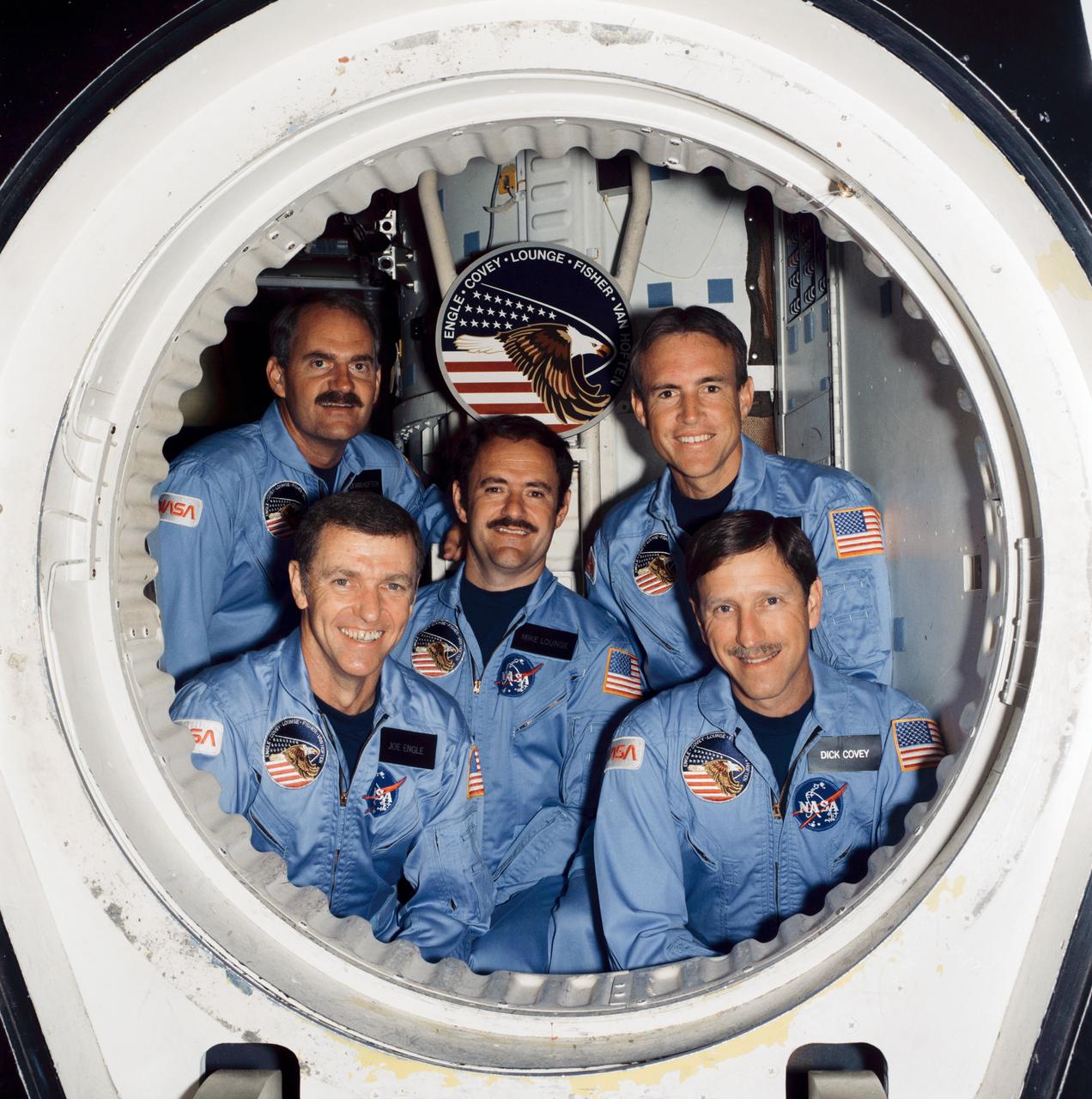 S85-36062 (1 July 1985) --- These five NASA astronauts make up the crew for the mission STS-51I, scheduled for launch in August of this year. Taking a break from rehearsals in the crew compartment trainer in the Shuttle Mockup and Integration Laboratory at JSC are astronauts Joe H. Engle (front left), crew commander; Richard O. Covey (front right), pilot; and (back row, left-to-right) astronauts James D. van Hoften, John M. (Mike) Lounge and William F. Fisher -- all mission specialists.