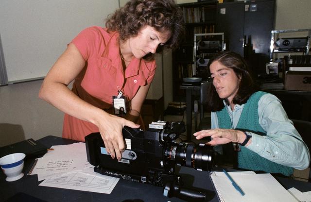 NASA image: Astronauts - McAuliffe and Morgan - Camera Training - JSC