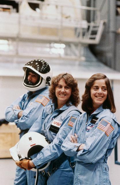 NASA image: Payload specialists in training for STS 51-L in mockup & integration lab