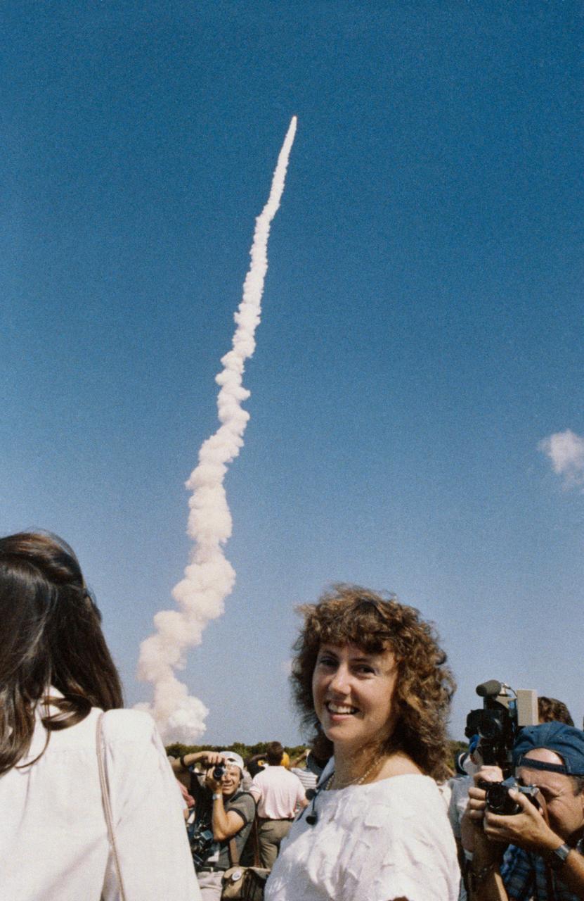 S86-25294 (30 Oct. 1985) --- Barbara R. Morgan and Sharon Christa McAuliffe (right) are pictured during a visit to NASA's Kennedy Space Center (KSC) Launch Complex 39 to witness the launch of the space shuttle Challenger. McAuliffe is scheduled to launch aboard the space shuttle Challenger, STS-51L mission, herself early next year as the United States? first in-space citizen observer.  Morgan is the backup for the Teacher-in-Space Project?s payload specialist position. The photo was taken by Keith Meyers of the New York Times.  EDITOR?S NOTE: The STS-51L crew members lost their lives in the space shuttle Challenger accident moments after launch on Jan. 28, 1986 from the Kennedy Space Center (KSC). Photo credit: NASA
