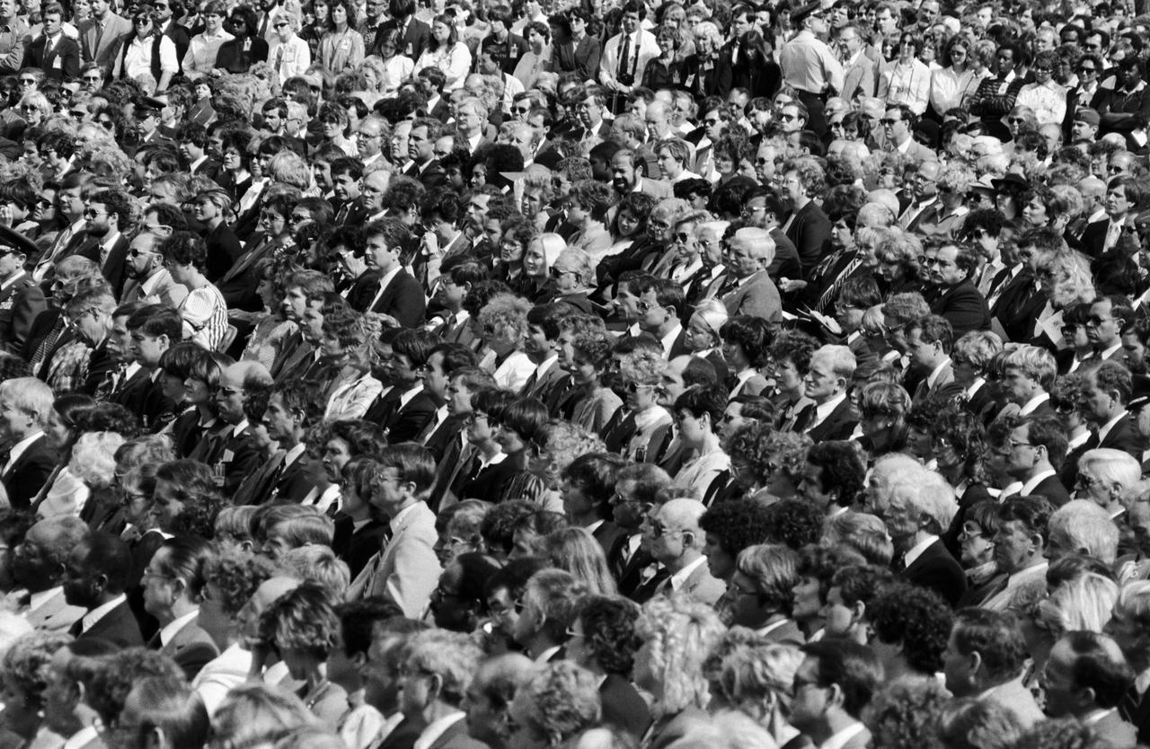 Overall view of the audience at the memorial service at JSC for the Crew of STS 51-L.