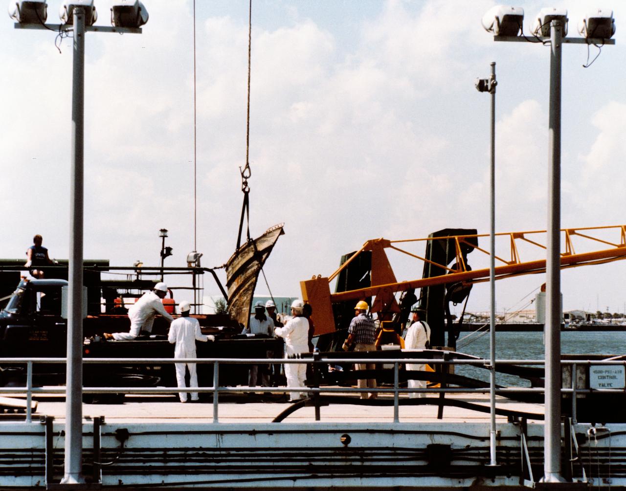 S86-29890 (20 March 1986) --- Stena workhorse arrival and offload of SRB. Trident Basin. (112) (st)