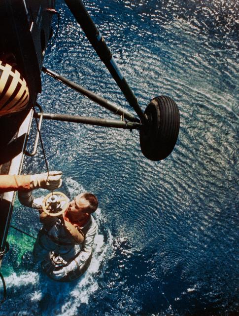 NASA image: Astronaut Alan Shepard is rescued by helicopter at end of MR-3 flight