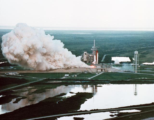 Documentary views of the STS-26 Flight Readiness Firing at KSC, Pad 39B, on