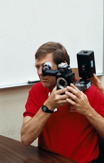 NASA image: STS-34 Pilot Michael J. McCulley uses ARRIFLEX camera equipment