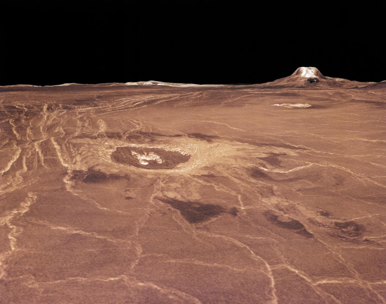 Magellan synthetic aperture radar data was used to create this three- dimensional (3D) perspective view of Venus' western Eistla Regio. This viewpoint is located at 1,310 kilometers (812 miles) southwest of Gula Mons at an elevation of 0.178 kilometers (0.48 miles). The view is of the northeast with Gula Mons appearing on the horizon. Gula Mons, a 3 kilometer (1.86 mile) high volcano, is located at approximately 22 degrees north latitude, 359 degrees east longitude. The impact crater Cunitz, named for the astronomer and mathematician Maria Cunitz, is visible in the center of the image. The crater is 48.5 kilometers (30 miles) in diameter and is 215 kilometers (133 miles) from the viewer's position. Magellan synthetic aperture radar data is combined with radar altimetry to develop a 3D map of the surface. Rays cast in a computer intersect the surface to create a 3D view. Simulated color and a digital elevation map developed by the United States (U.S.) Geological Survey is used to enhance small-scale structure. The simulated hues are based on color images recorded by the Soviet Venera 13 and 14 spacecraft. The image was produced at the Jet Propulsion Laboratory (JPL) Multimission Image Processing Laboratory and is a single frame from a video released at the JPL news conference 03-05-91. View was provided by JPL with alternate number P-38720 MGN76.