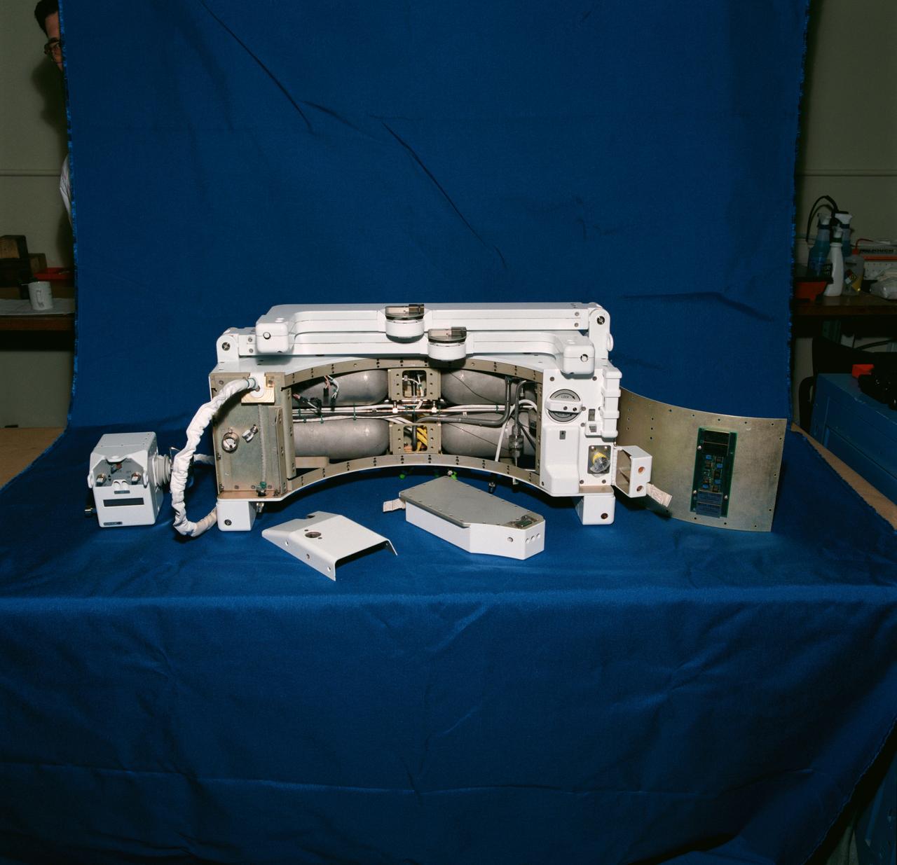 S93-50137 (December 1993) --- This small mobility-aiding back harness, complemented in extravehicular activity (EVA) with a hand controller unit and called the Simplified Aid for EVA Rescue (SAFER) system, will get extensive in-space evaluation and testing during the STS-64 mission. In this view the SAFER is open to reveal the gas supply and thrusters. SAFER is to fly on STS-76 as well.