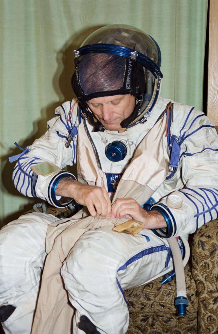 Astronaut Norman E. Thagard in a cosmonaut space suit in the Training Simulator Facility at the Gagarin Cosmonaut Training Center (Star City), near Moscow, Russia. In March 1995, astronaut Thagard is scheduled to be launched in a Russian Soyuz spacecraft with two cosmonauts to begin a three-month tour of duty on the Russian Mir Space Station. Thagard, along with his back-up, astronaut Bonnie J. Dunbar, has been training in Russian since February 1994.