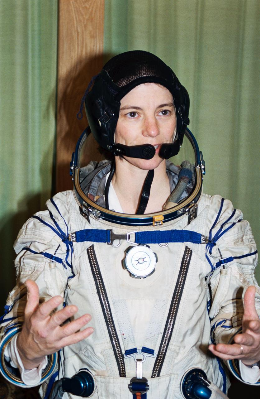 Astronaut Bonnie J. Dunbar in a cosmonaut space suit in the Training Simulator Facility at the Gagarin Cosmonaut Training Center (Star City), near Moscow, Russia. In March 1995, astronaut Norman E. Thagard is scheduled to be launched in a Russian Soyuz spacecraft with two cosmonauts to begin a three-month tour of duty on the Russian Mir Space Station. Thagard, along with his back-up, astronaut Bonnie J. Dunbar, has been training in Russian since February 1994.