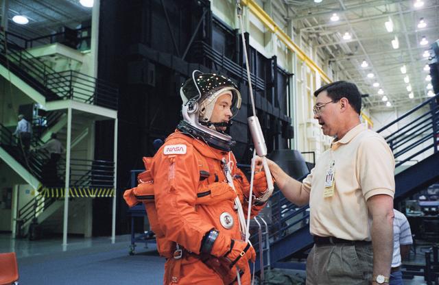 NASA image: Astronaut Michael E. Lopez-Alegria during post-landing egress training