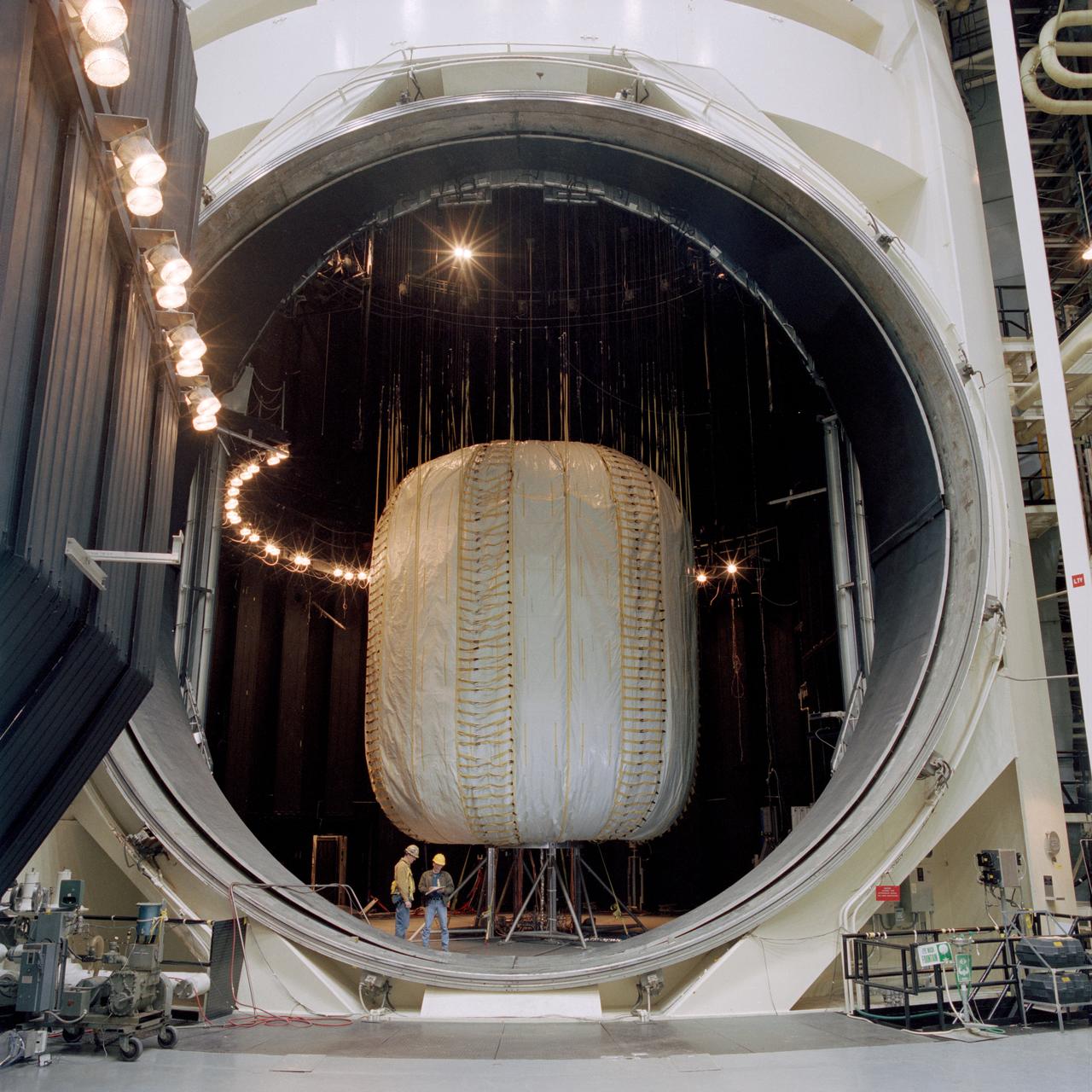 S98-00157 --- A mock-up of TransHab, the large-volume inflatable space vehicle, is seen during 1998 testing at the Johnson Space Center’s Space Environment Simulation Laboratory (SESL). SESL houses the giant Chamber A, the door of which has a 40-foot diameter and weight of 40 tons. TransHab, the large-volume inflatable space vehicle, was a proposed design for a habitation element for lengthy space missions. It is not part of NASA’s current plans. Photo credit: NASA or National Aeronautics and Space Administration