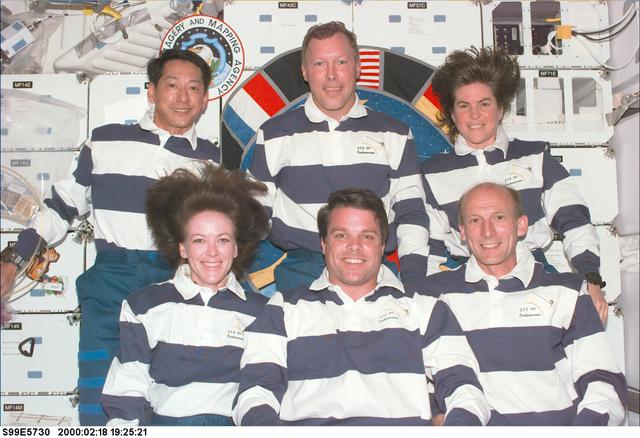 NASA image: STS-99 crewmembers pose for inflight portrait on OV-105's middeck