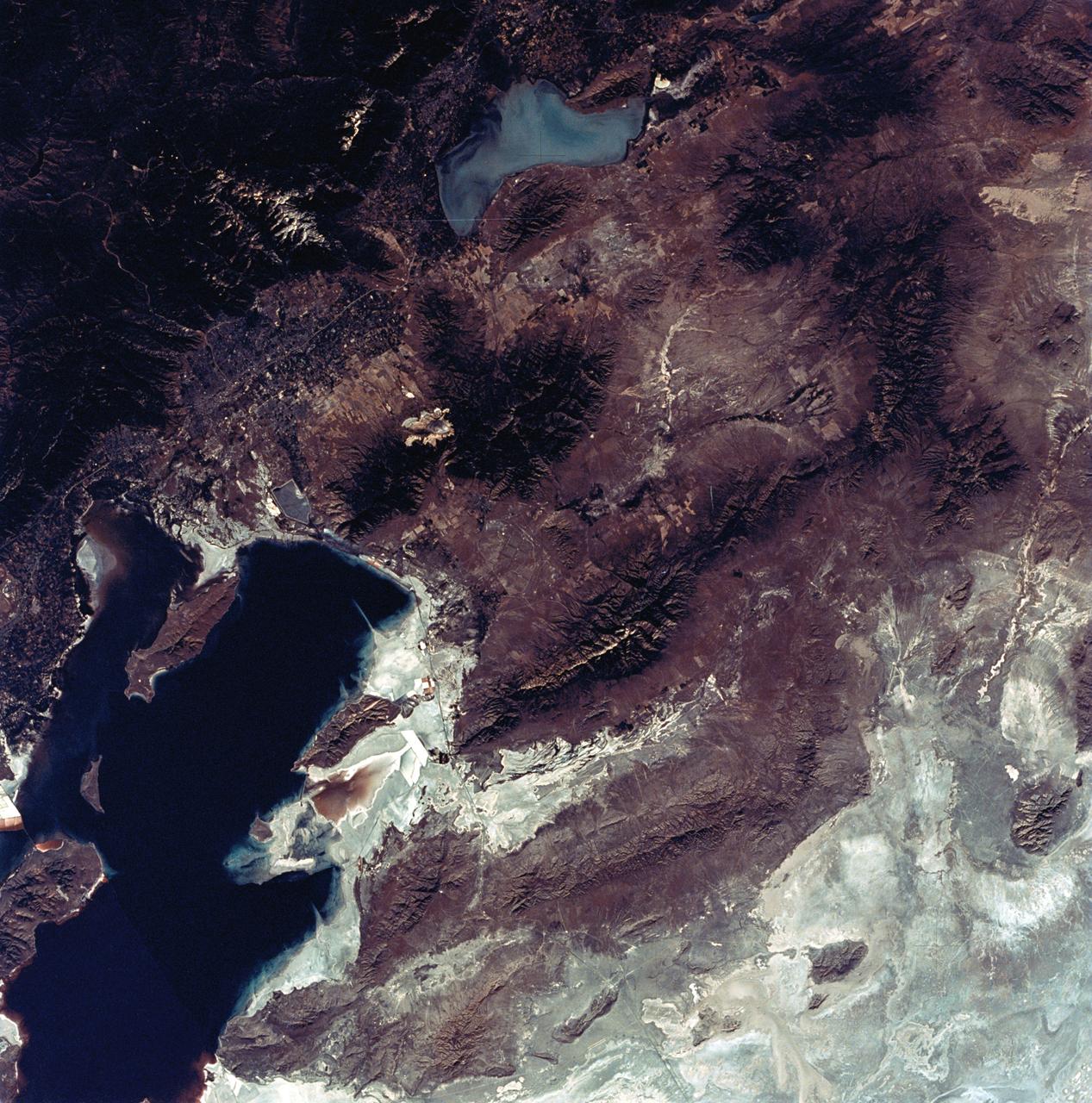 SL3-22-0322 (July-September 1973) --- An oblique view of the Salt Lake City, Utah area as photographed from Earth orbit by one of the six lenses of the Itek-furnished S190-A Multispectral Photographic Facility Experiment aboard the Skylab space station.  Approximately two-thirds of the Great Salt Lake is in view. The smaller body of water south of Salt Lake City is Utah Lake. The Wasatch Range is on the east side of the Great Salt Lake. Federal agencies participating with NASA on the EREP project are the Departments of Agriculture, Commerce, Interior, the Environmental Protection Agency and the Corps of Engineers. All EREP photography is available to the public through the Department of Interior?s Earth Resources Observations Systems Data Center, Sioux Falls, South Dakota, 57198. Photo credit: NASA
