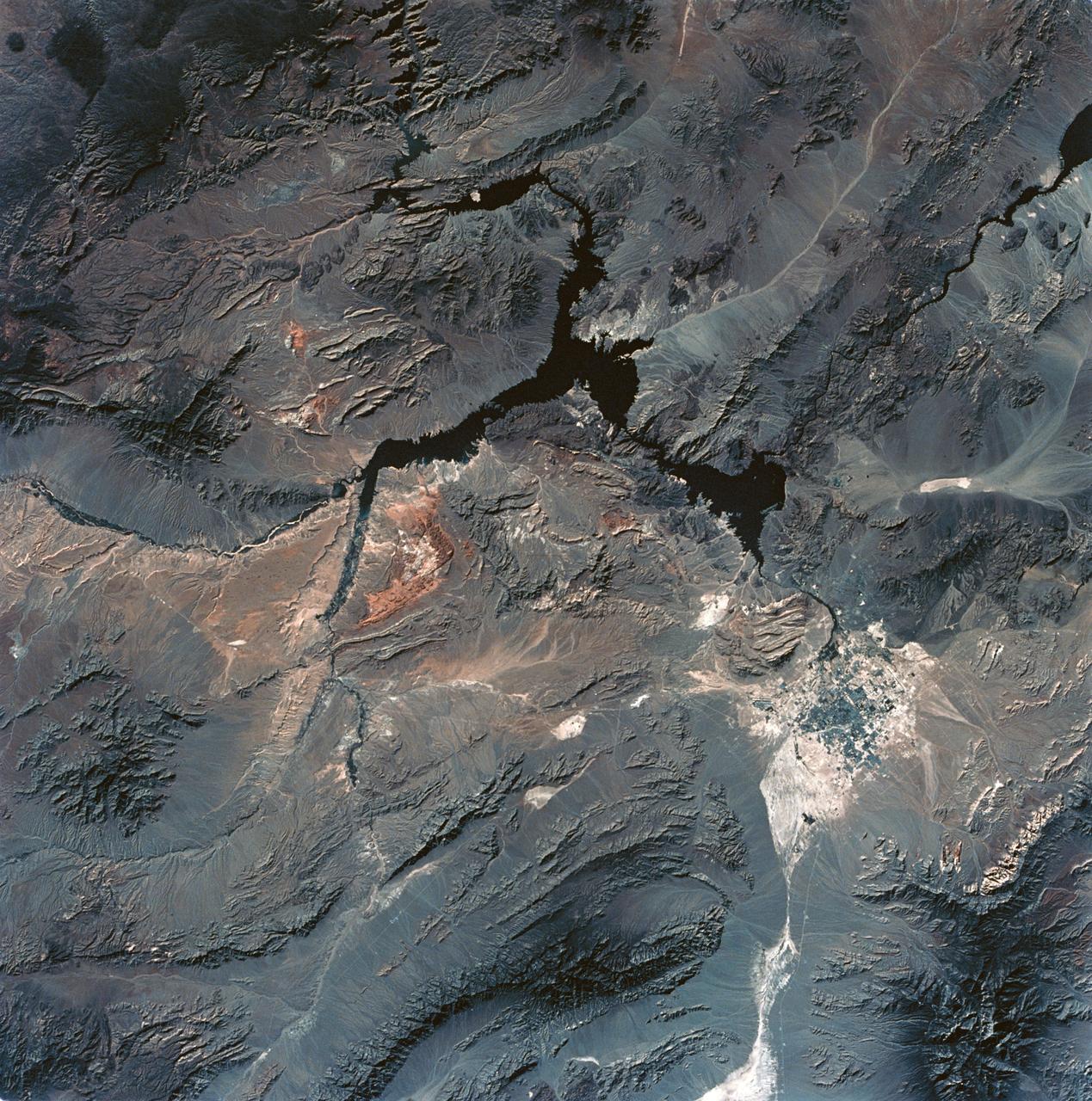 SL3-28-059 (July-September 1973) --- A vertical view of the Lake Mead and Las Vegas, Nevada area as photographed from Earth orbit by one of the six lenses of the Itek-furnished S190-A Multispectral Photographic Facility Experiment aboard the Skylab space station.  Lake Mead is water of the Colorado River impounded by Hoover Dam. Most of the land in the picture is Nevada. However, a part of the northwest corner of Arizona can be seen.  Federal agencies participating with NASA on the EREP project are the Departments of Agriculture, Commerce, Interior, the Environmental Protection Agency and the Corps of Engineers. All EREP photography is available to the public through the Department of Interior?s Earth Resources Observations Systems Data Center, Sioux Falls, South Dakota, 57198. Photo credit: NASA
