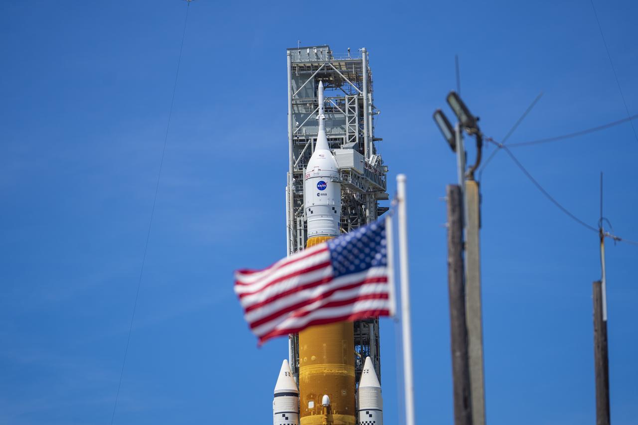 NASA’s Space Launch System (SLS) rocket with the Orion spacecraft aboard is seen atop the mobile launcher at Launch 39B at NASA’s Kennedy Space Center in Florida. Artemis I mission is the first integrated test of the agency’s deep space exploration systems: the Space Launch System rocket, Orion spacecraft, and supporting ground systems. The mission is the first in a series of increasingly complex missions to the Moon. Launch of the uncrewed flight test is targeted for no earlier than Aug. 29 at 8:33 a.m. ET. With Artemis missions, NASA will land the first woman and first person of color on the Moon, using innovative technologies to explore more of the lunar surface than ever before.