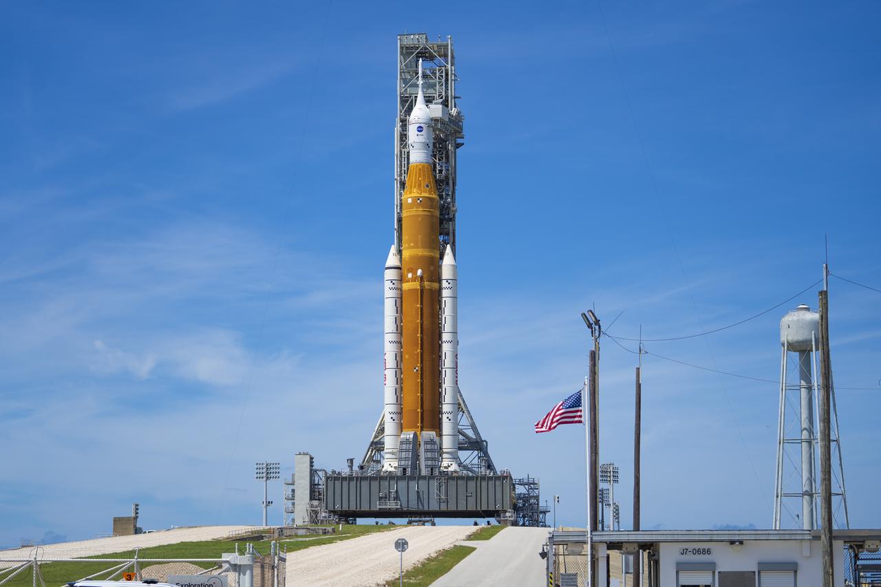 NASA’s Space Launch System (SLS) rocket with the Orion spacecraft aboard is seen atop the mobile launcher at Launch 39B at NASA’s Kennedy Space Center in Florida. Artemis I mission is the first integrated test of the agency’s deep space exploration systems: the Space Launch System rocket, Orion spacecraft, and supporting ground systems. The mission is the first in a series of increasingly complex missions to the Moon. Launch of the uncrewed flight test is targeted for no earlier than Aug. 29 at 8:33 a.m. ET. With Artemis missions, NASA will land the first woman and first person of color on the Moon, using innovative technologies to explore more of the lunar surface than ever before.