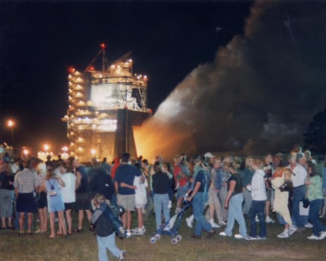 NASA image: Public views evening engine test of a Space Shuttle Main Engine