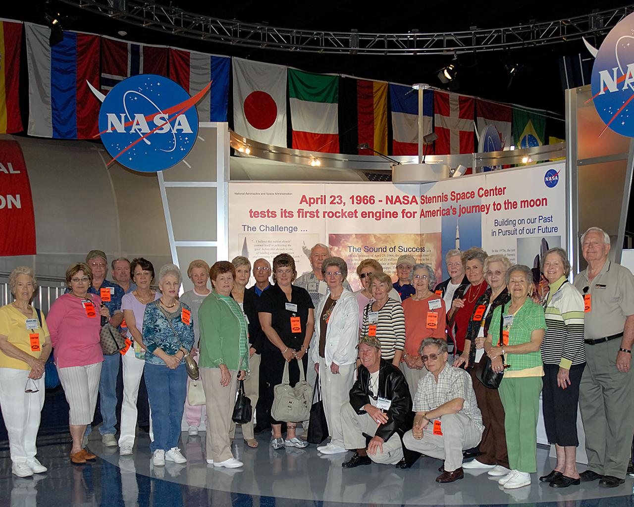 On April 24, a group traveling with Diamond Tours visited StenniSphere, the visitor center at NASA John C. Stennis Space Center in South Mississippi. The trip marked Diamond Tours' return to StenniSphere since Hurricane Katrina struck the Gulf Coast on Aug. 29, 2005. About 25 business professionals from Georgia enjoyed the day's tour of America's largest rocket engine test complex, along with the many displays and exhibits at the museum. Before Hurricane Katrina, the nationwide company brought more than 1,000 visitors to StenniSphere each month. That contributed to more than 100,000 visitors from around the world touring the space center each year. In past years StenniSphere's visitor relations specialists booked Diamond Tours two or three times a week, averaging 40 to 50 people per visit. SSC was established in the 1960s to test the huge engines for the Saturn V moon rockets. Now 40 years later, the center tests every main engine for the space shuttle. SSC will soon begin testing the rocket engines that will power spacecraft carrying Americans back to the moon and on to Mars. For more information or to book a tour, visit http://www.nasa.gov/centers/stennis/home/index.html and click on the StenniSphere logo; or call 800-237-1821 or 228-688-2370.