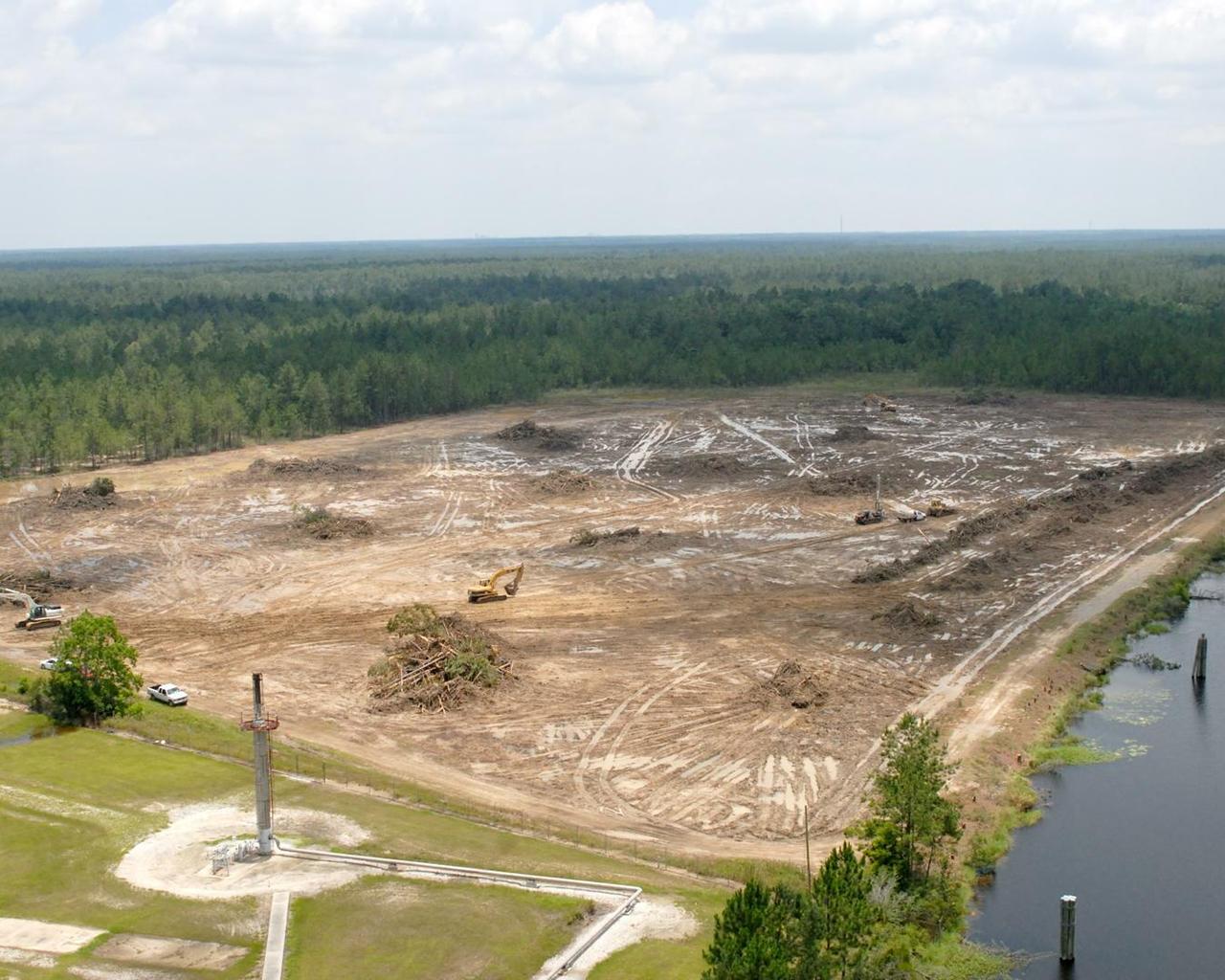 Work to clear the site for the A-3 Test Stand progresses quickly, as seen in this photo taken June 18 from atop the A-1 Test Stand. The next step in construction at 19-acre site will be the arrival of fill dirt in mid-July, followed by pilings and piling caps.