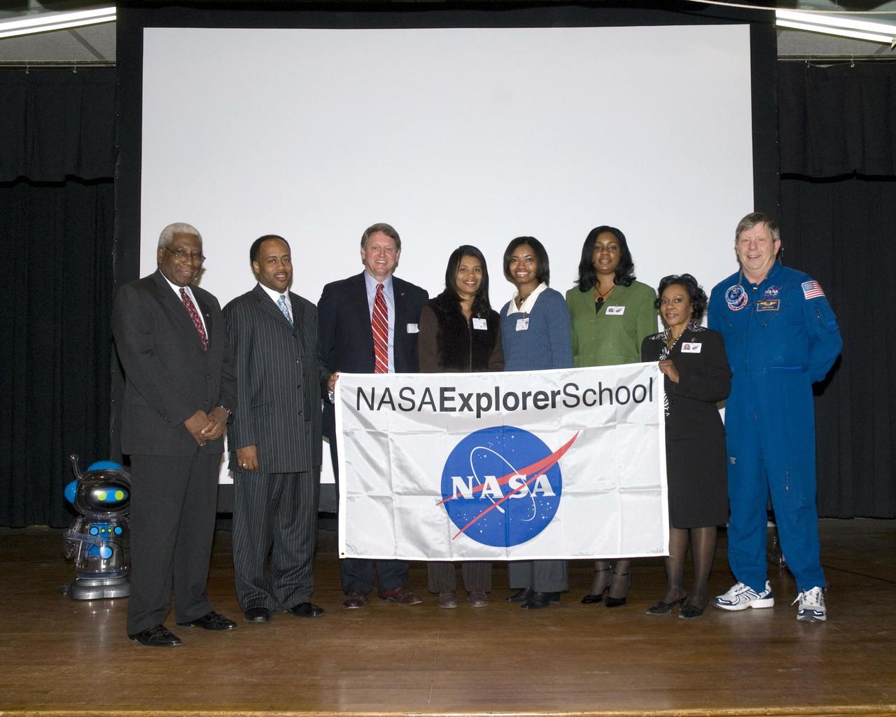 The NASA Explorer School-East Oktibbeha County School District team recently celebrated the start of its three-year partnership with NASA during a two-part kickoff event Nov. 7 and 8. Pictured from left are, Oktibbeha County School District Superintendent Dr. Walter Conley; NES Team Administrator James Covington; Stennis Space Center Deputy Director Gene Goldman; Sharon Bonner; NES Team Lead Yolanda Magee; Andrea Temple; Carolyn Rice; and special guest astronaut Roger Crouch.