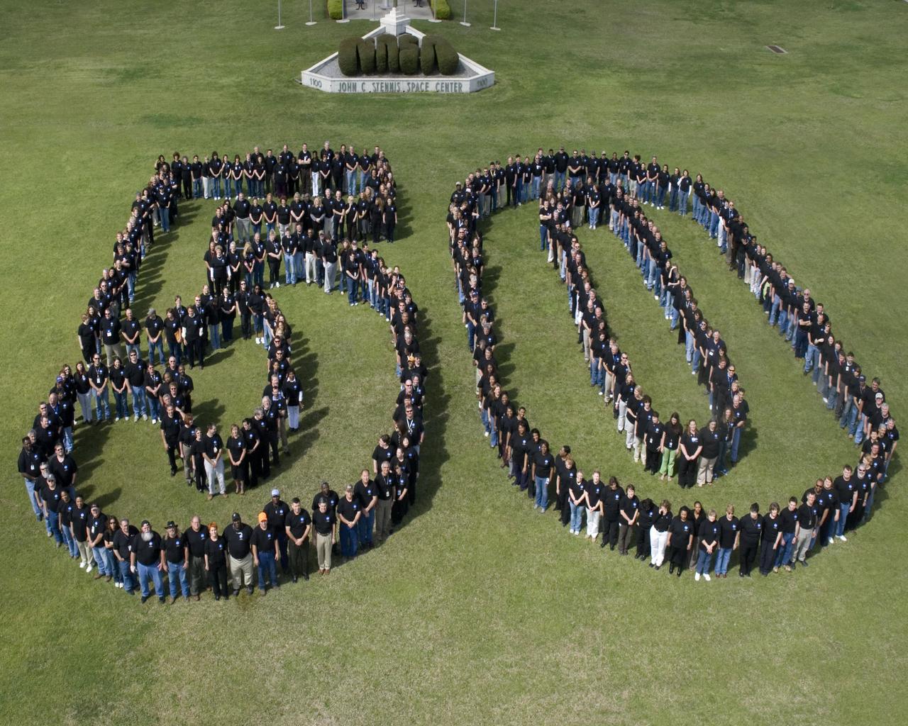 On March 19, employees of Stennis Space Center formed the number 50 to celebrate NASA's 50th anniversary, October 2008. Employees wore their NASA 50th anniversary T-shirts for the photo.