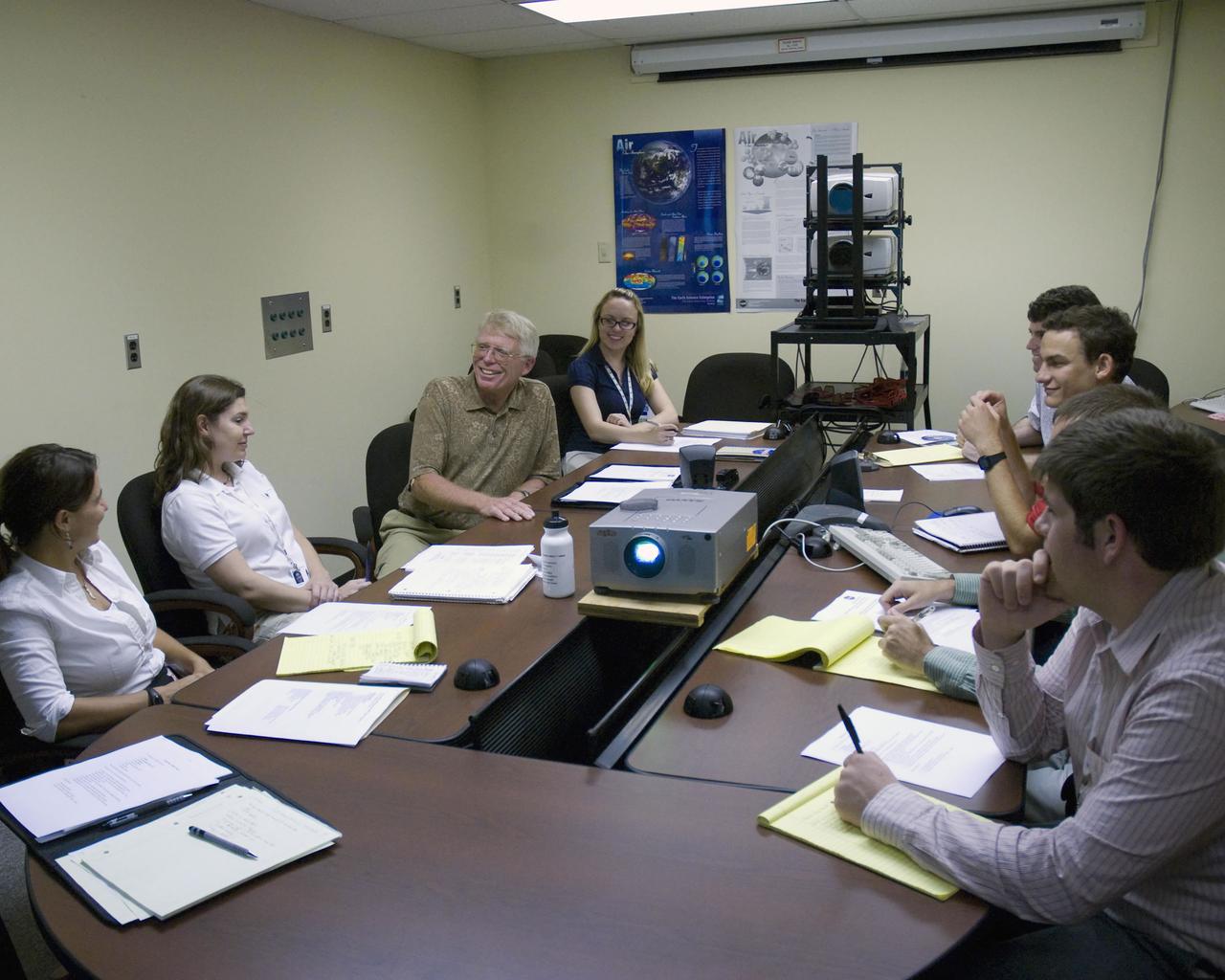 NASA DEVELOP students at Stennis Space Center recently held a midterm review with George Crozier, who serves as a science adviser to the team. The team also was joined by Jamie Favors of the Mobile (Ala.) County Health Department DEVELOP Team; Cheri Miller, the team's NASA adviser; and Kenton Ross, a team science adviser. Students participating in the meeting included: Lauren Childs, Jason Jones, Maddie Brozen, Matt Batina, Jenn Frey, Angie Maki and Aaron Brooks. The primary purpose of the meeting was to update Crozier on the status of the team's work for the summer 2008 term and discuss plans for the fiscal year 2009 project proposal. This included discussion of a possible project to study the effects of hurricanes on the Florida panhandle. DEVELOP is a NASA-sponsored, student-led, student-run program focused on developing projects to help communities.