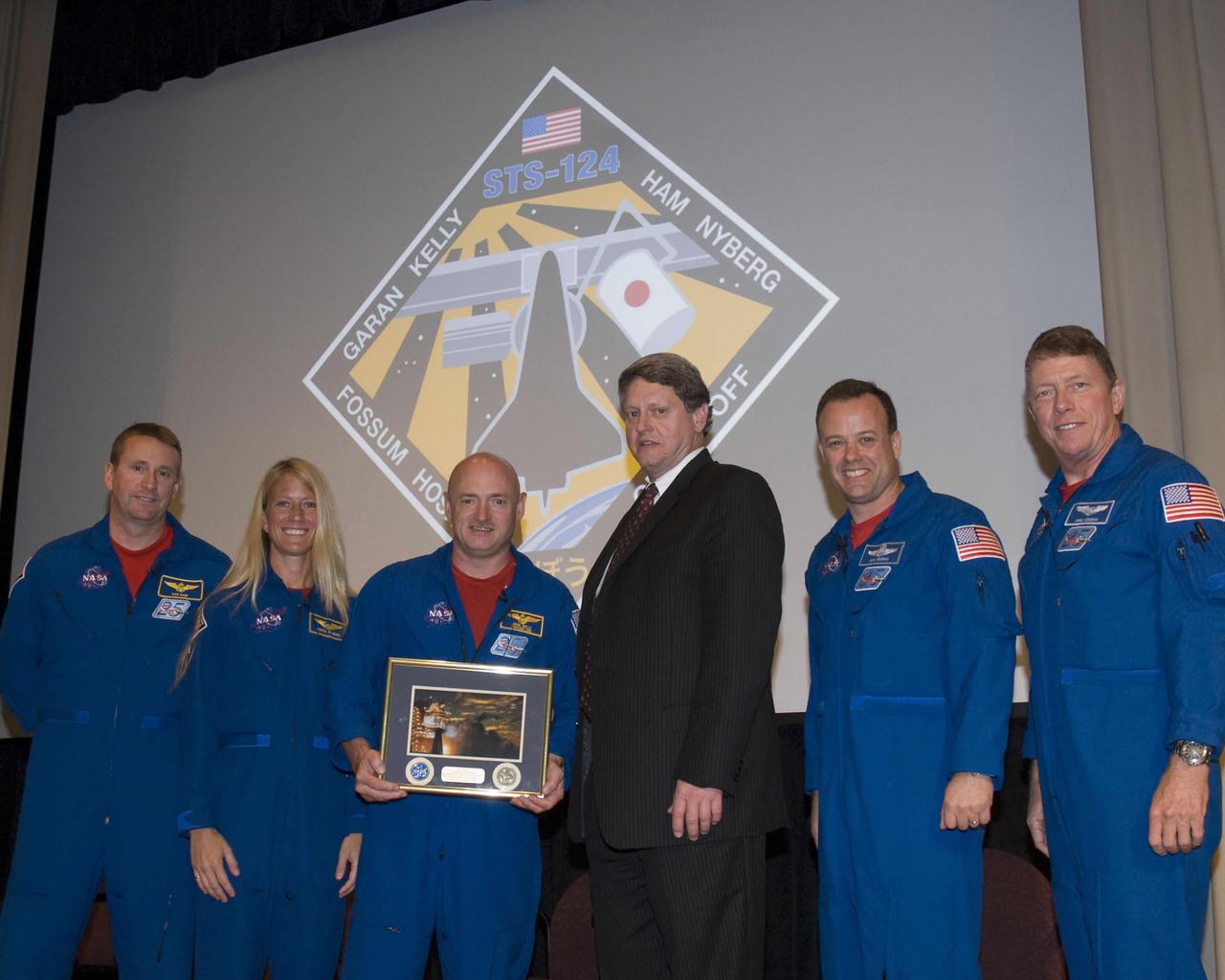 NASA's John C. Stennis Space Center Deputy Director Gene Goldman (center) welcomed members of the STS-124 Discovery space shuttle crew during their July 23 visit to the center. Crew members who visited Stennis were (l to r) Pilot Ken Ham, Mission Specialist Karen Nyberg, Kelly, and Mission Specialists Ron Garan and Mike Fossum.