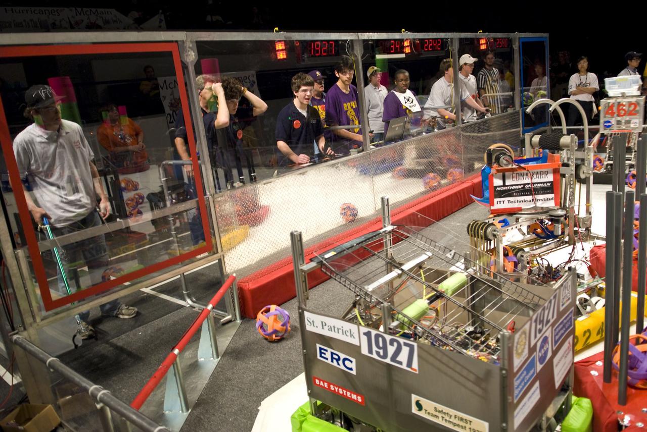 Students (left) from St. Patrick Catholic High School in Biloxi, Miss., maneuver their robot during the 2009 Bayou Regional competition.