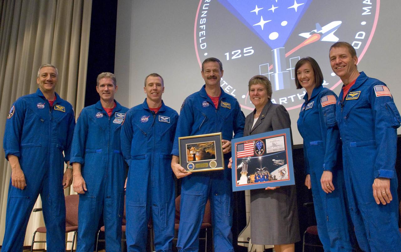 Astronauts from the STS-125 mission to repair the Hubble Space Telescope shared accounts of their mission today at StenniSphere. The crewmembers-Commander Scott Altman, Pilot Greg Johnson and Mission Specialists Megan McArthur, Michael Good, Drew Feustel and Mike Massimino-thanked Stennis employees for their contributions to the success of the mission and presented a plaque to Marina Benigno, director of center operations. Pictured are (l to r) Massimino, Good, Feustel, Altman, McArthur and Johnson.