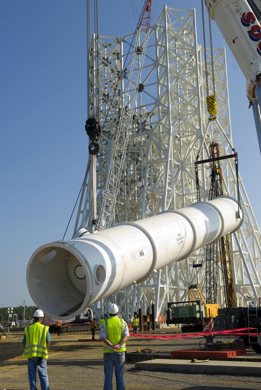 Water storage vessels for the A-3 Test Stand are delivered to Stennis on Aug. 12.