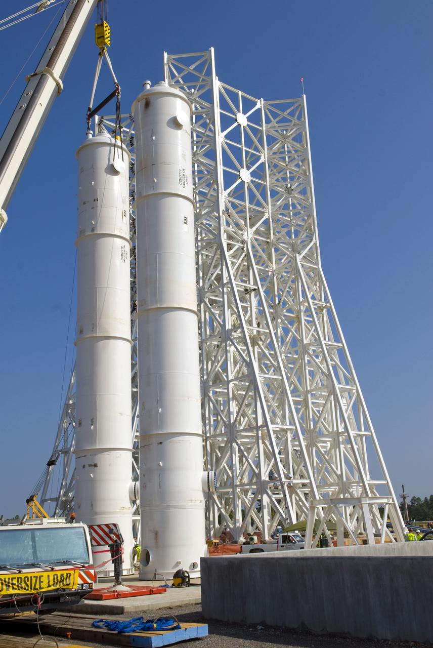 Water storage vessels for the A-3 Test Stand are delivered to Stennis on Aug. 12.