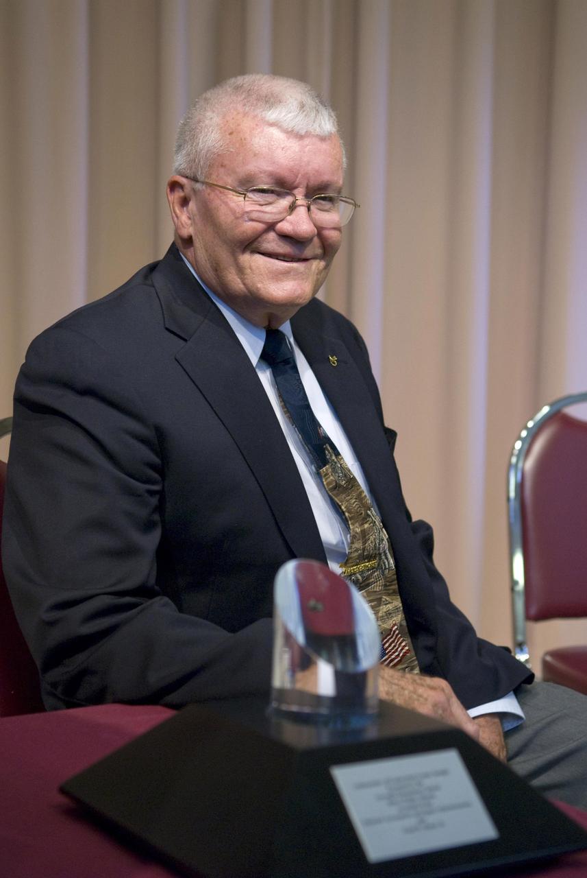 Apollo 13 astronaut and Biloxi native Fred Haise Jr. smiles during a Dec. 2 ceremony at Gorenflo Elementary School in Biloxi honoring his space career. During the ceremony, Haise was presented with NASA's Ambassador of Exploration Award (an encased moon rock). He subsequently presented the moon rock to Gorenflo officials for display at the school. Haise is best known as one of three astronauts who nursed a crippled Apollo 13 spacecraft back to Earth during a perilous 1970 mission. Although he was unable to walk on the moon as planned for that mission, Haise ended his astronaut career having logged 142 hours and 54 minutes in space. During the ceremony, he praised all those who contributed to the space program.