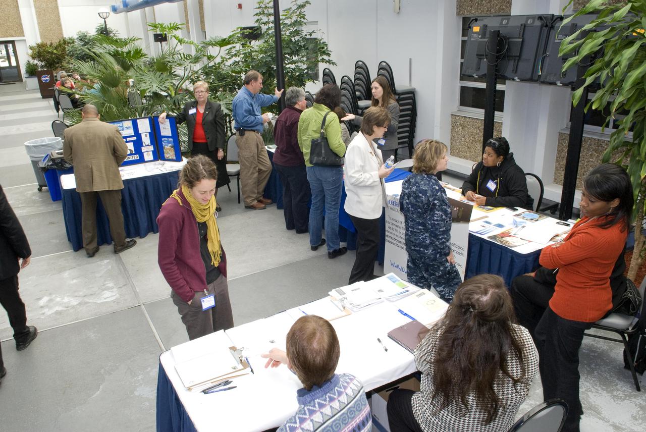 Employees at NASA's John C. Stennis Space Center visit exhibits of volunteer organizations during their observance of Martin Luther King Jr. Day with a Day of Service on Jan. 12. During the day, Mississippi and Louisiana organizations visited the center to encourage employees to register and serve as volunteers for various community activities. The day's focus was emphasized again and again - great things can happen when individuals work together toward a common goal.