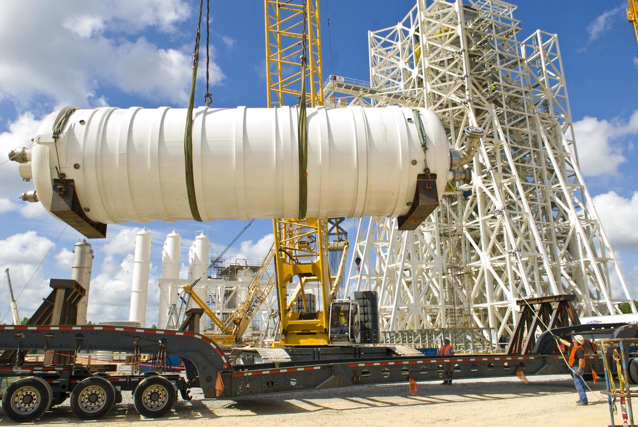 A 35,000-gallon liquid oxygen tank is placed at the A-3 Test Stand construction site on Sept. 24, 2010. The tank will provide propellant for tests of next-generation rocket engines at the stand. It will be placed upright on top of the stand, helping to increase the overall height to 300 feet. Once completed, the A-3 Test Stand will enable operators to test rocket engines at simulated altitudes of up to 100,000 feet. The A-3 stand is the first large rocket engine test structure to be built at Stennis Space Center since the 1960s.