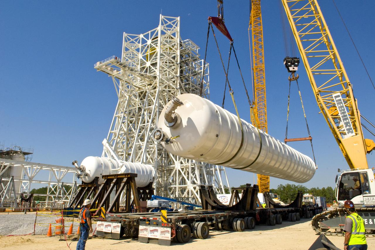 An 80,000-gallon liquid hydrogen tank is placed at the A-3 Test Stand construction site on Sept. 24, 2010. The tank will provide propellant for tests of next-generation rocket engines at the stand. It will be placed upright on top of the stand, helping to increase the overall height to 300 feet. Once completed, the A-3 Test Stand will enable operators to test rocket engines at simulated altitudes of up to 100,000 feet. The A-3 stand is the first large rocket engine test structure to be built at Stennis Space Center since the 1960s.