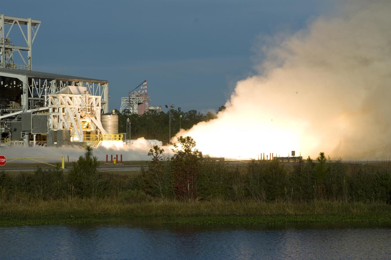 Fire and steam signal a successful test firing of Orbital Sciences Corporation's Aerojet AJ26 rocket engine at John C. Stennis Space Center. AJ26 engines will be used to power Orbital's Taurus II space vehicle on commercial cargo flights to the International Space Station. On Nov. 10, operators at Stennis' E-1 Test Stand conducted a 10-second test fire of the engine, the first of a series of three verification tests. Orbital has partnered with NASA to provide eight missions to the ISS by 2015.
