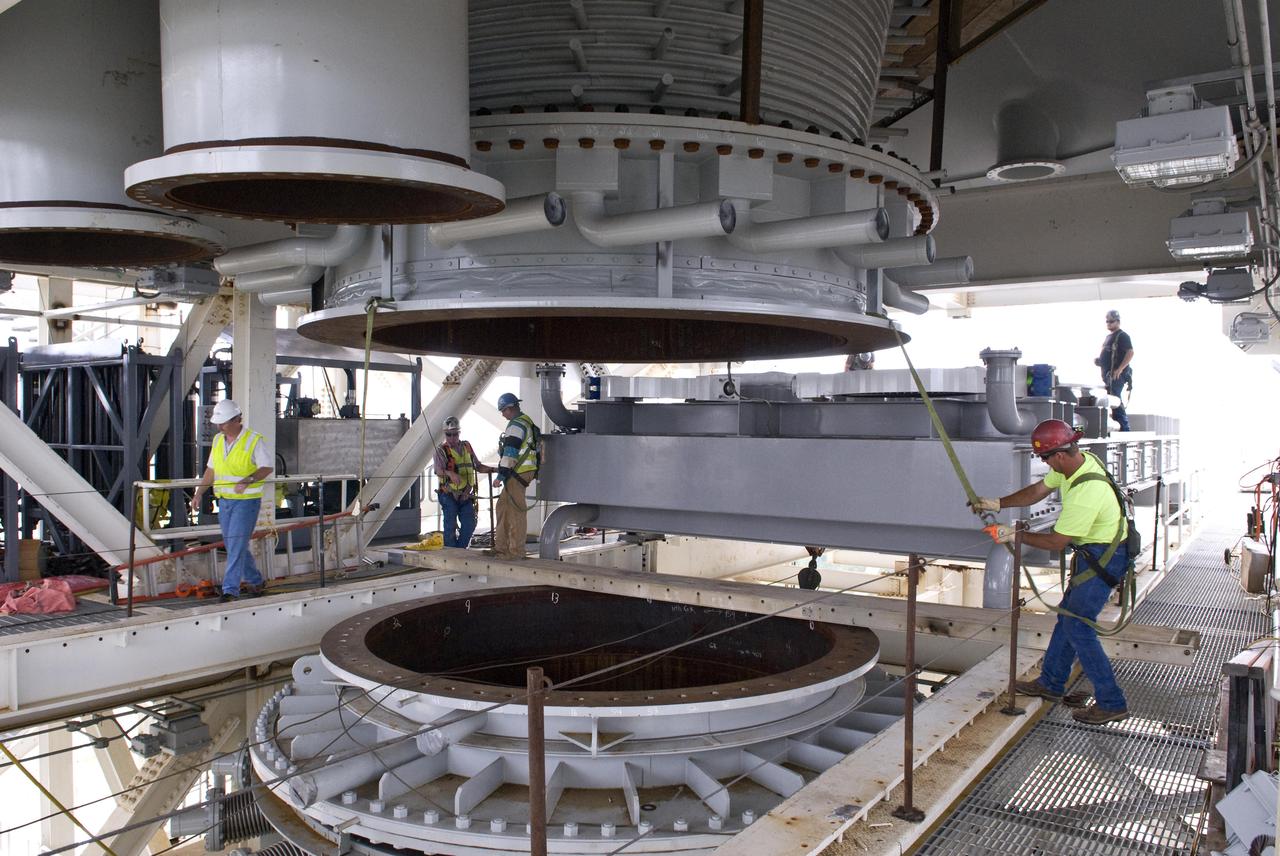 Stennis Space Center employees continue work on the A-3 Test Stand test cell. The stand is being built to test next-generation rocket engines that could carry humans beyond low-Earth orbit into deep space.