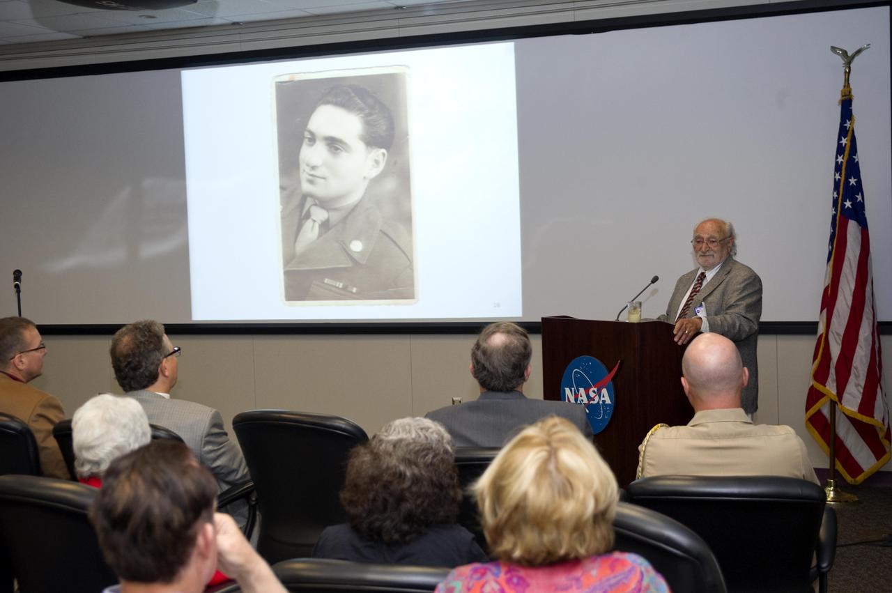 Av Szyller of Covington, La., recounts his experiences as a Jew living in occupied France in the early 1940s during a Holocaust Days of Remembrance gathering at Stennis Space Center on May 12. Szyller was arrested by Nazi soldiers but managed to escape France after several close calls. However, he lost his father and other family members in Auschwitz. Szyller, 83, returned to Europe in 1945 as a sergeant in the U.S. Army. After the war, he located to Louisiana, where he practices clinical psychology.