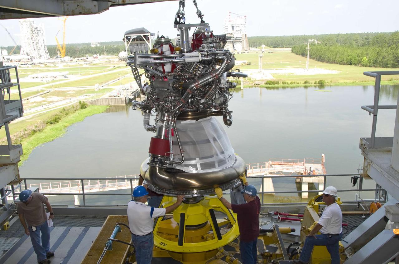 A J-2X next-generation rocket engine is lifted onto the A-2 Test Stand at Stennis Space Center. Testing of the engine began the following month. The engine is being developed for NASA by Pratt & Whitney Rocketdyne and could help carry humans beyond low-Earth orbit into deep space once more.