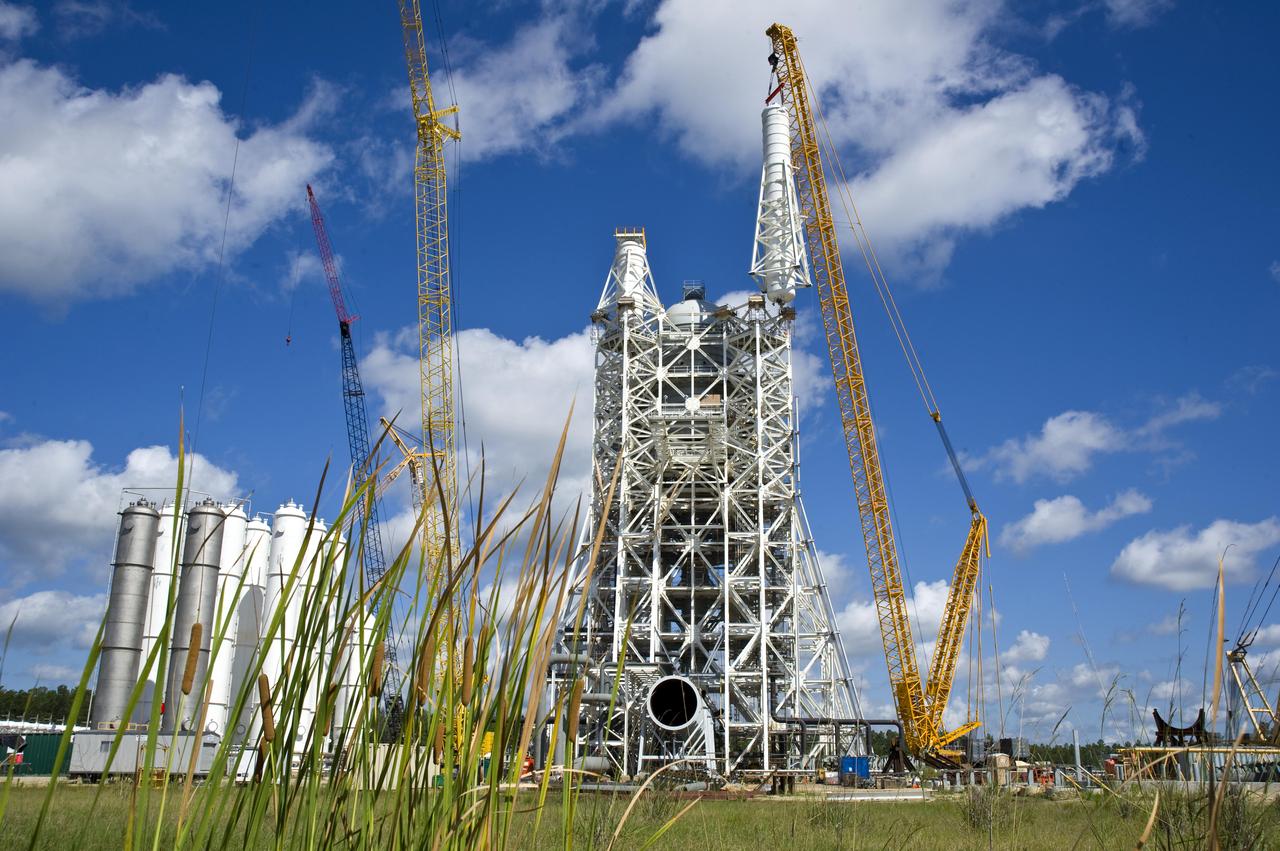 Stennis Space Center employees marked another construction milestone July 25 with installation of the 85,000-gallon liquid hydrogen tank atop the A-3 Test Stand. The 300-foot-tall stand is being built to test next-generation rocket engines that could carry humans into deep space once more. The liquid hydrogen tank and a 35,000-gallon liquid oxygen tank installed atop the steel structure earlier in June will provide fuel propellants for testing the engines.