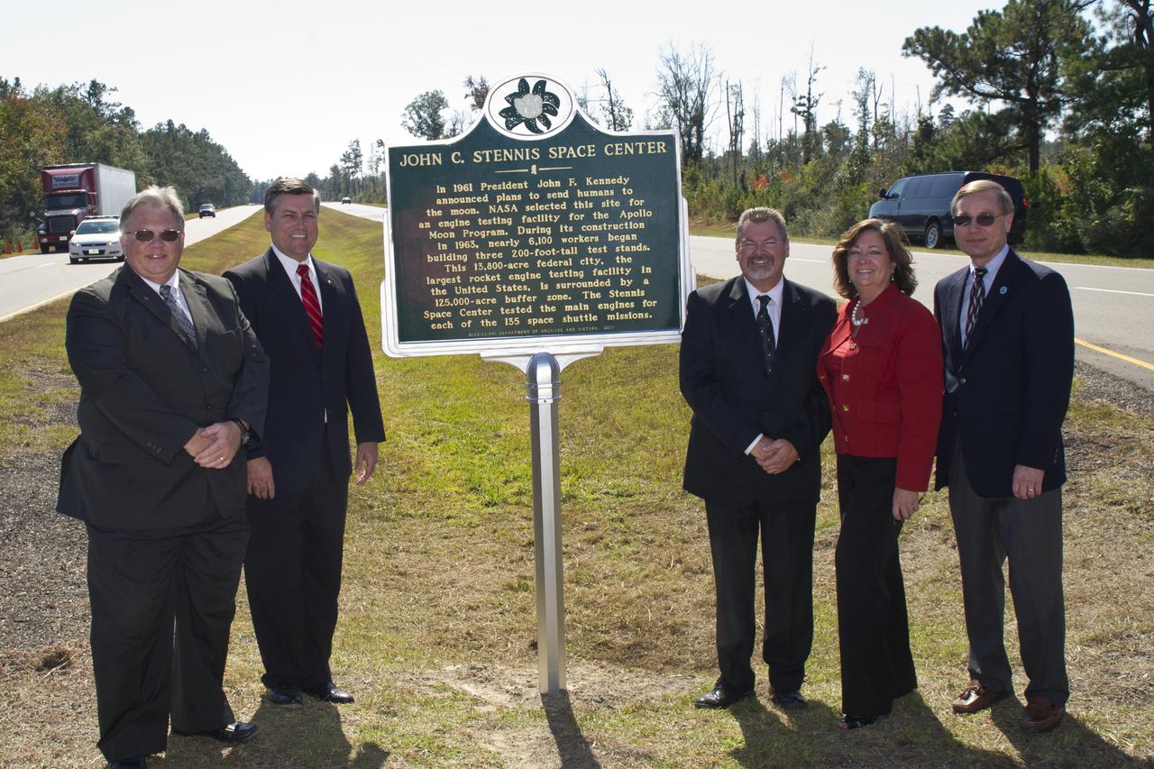 Stennis Space Center Director Patrick Scheuermann (second from left) stands at the historical marker erected by the state of Mississippi in honor of the 50th anniversary of the NASA facility. Joining Scheuermann are: (l to r) Ron Magee, Al Watkins, Tish Williams and Ken P'Pool.